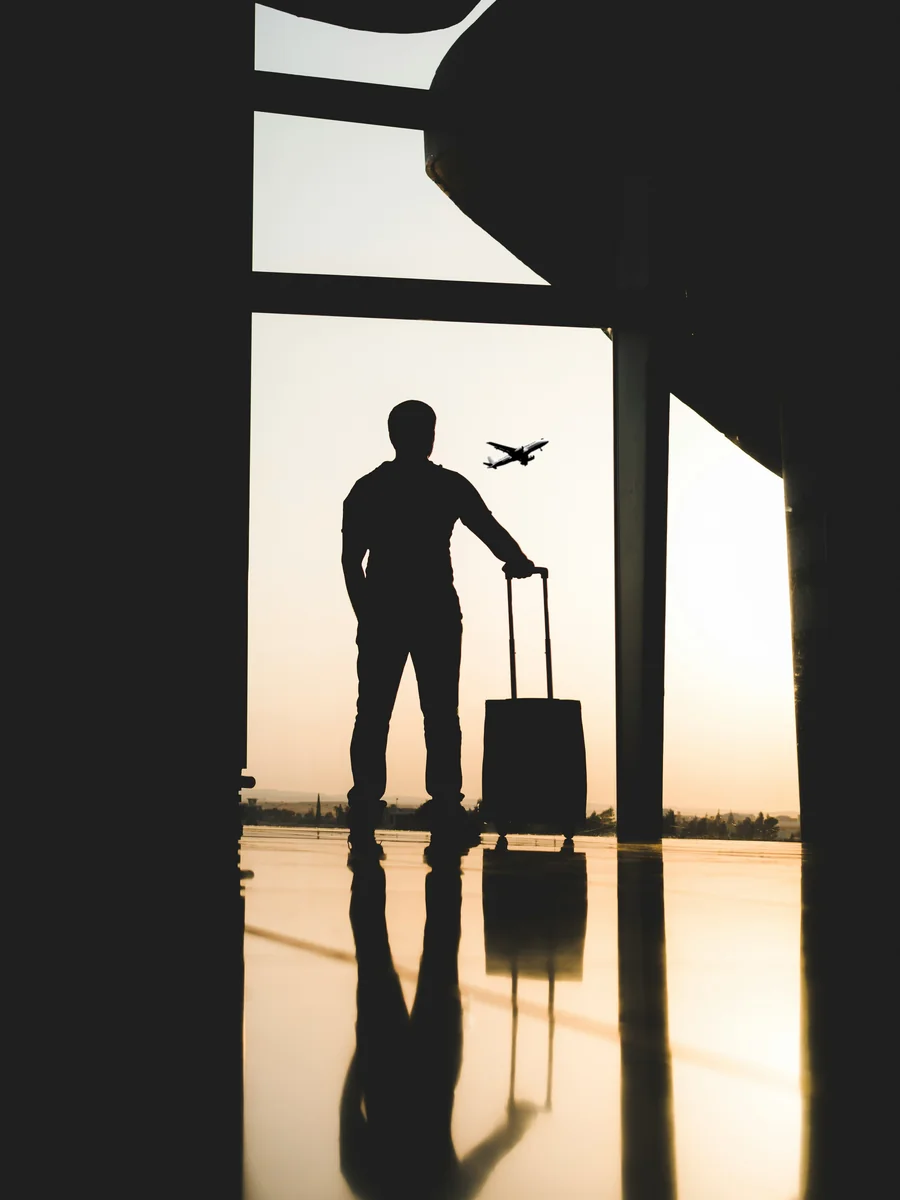 Traveller at the airport departure gate